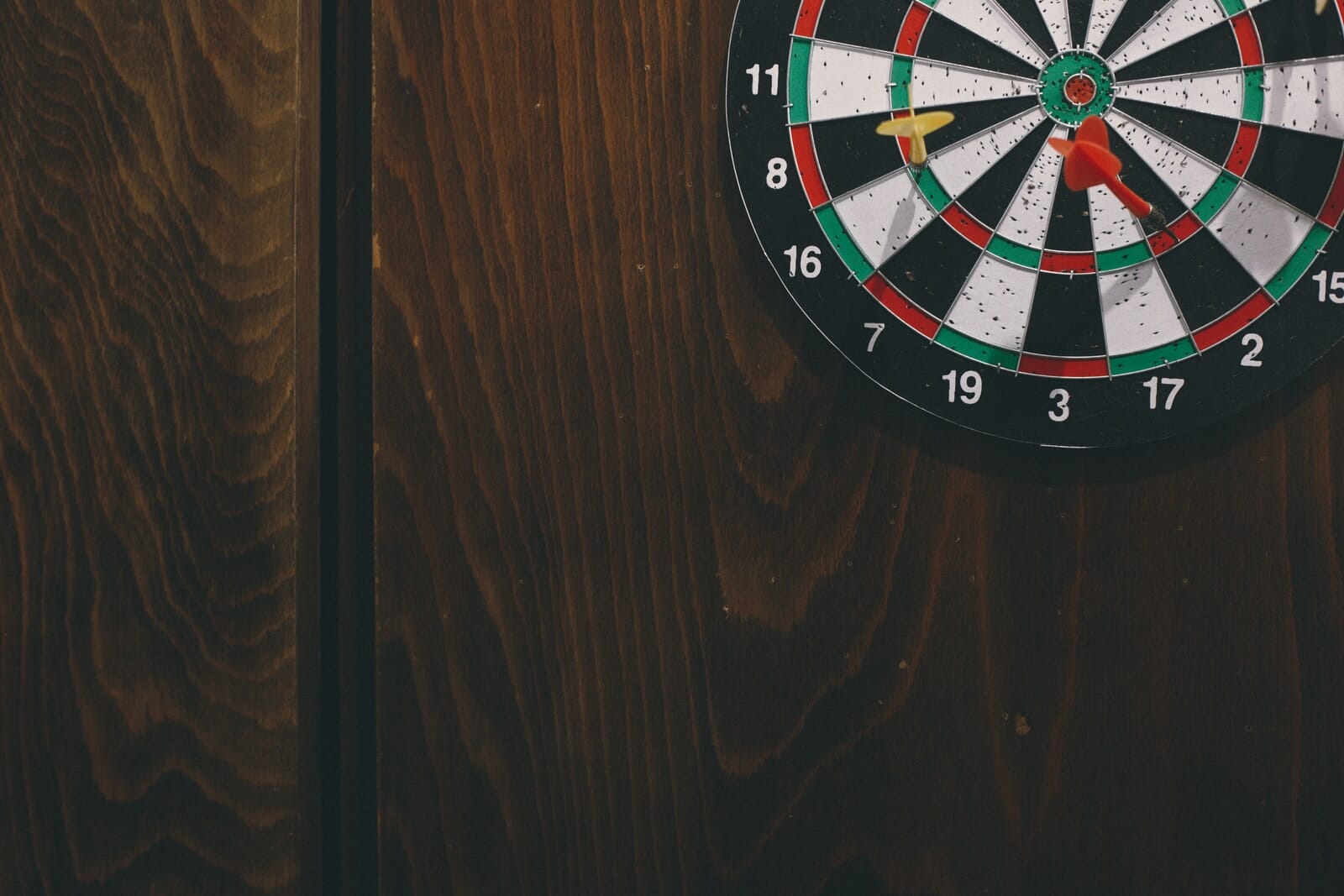 black white red and green round analog clock